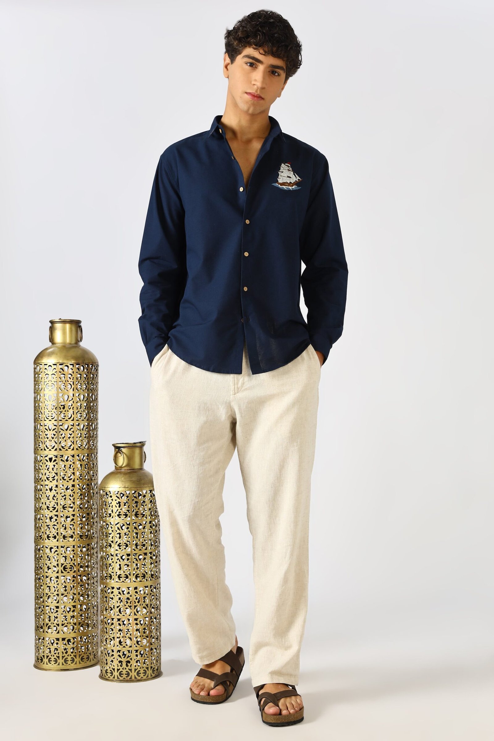 1L9A9954_61af989b-02e3-4bee-b4a5-d58680bf5082-scaled-1.jpg Ocean Voyage Blue Travel-Inspired Embroidered Shirt - Image 1