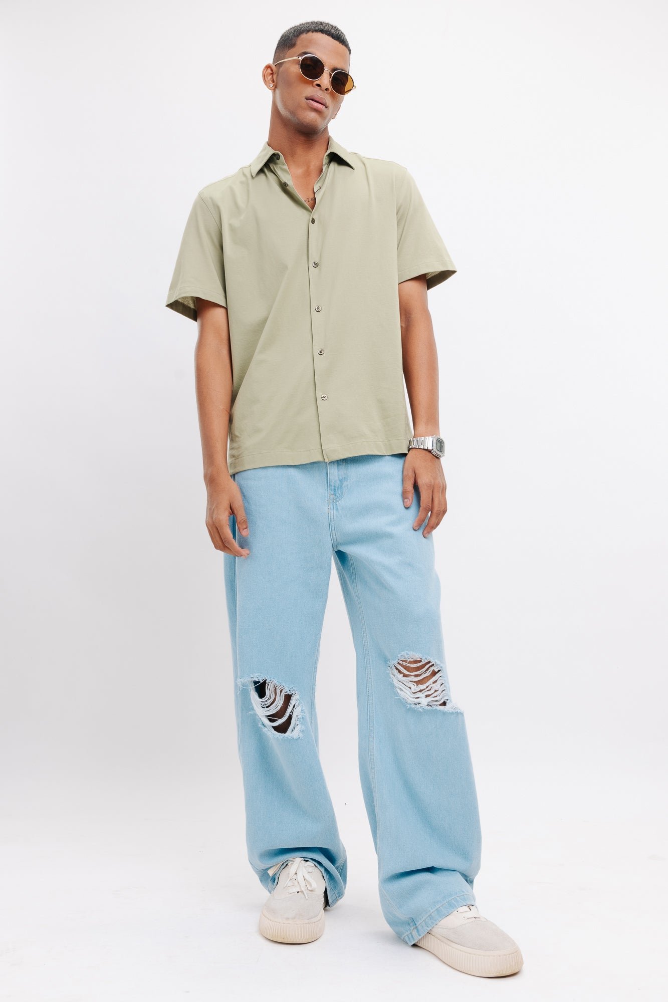 DSC_3865_3f1dadb7-7307-4d21-a186-ed442a02326d.jpg Sky Blue Light Wash Distressed Wide-Leg Denim Jeans for Men - Image 1